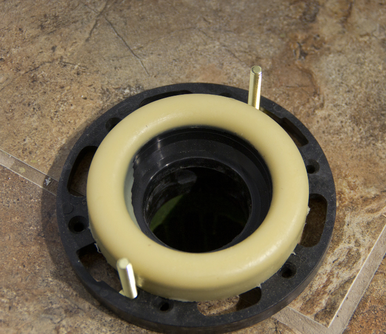 Loose toilet wax ring replacement